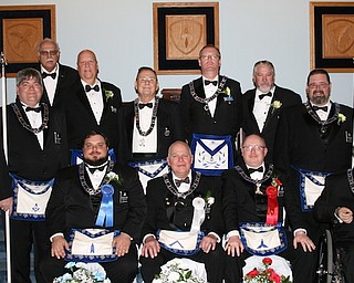 Argus Lodge 545 F&AM recently hosted its 133rd annual installation of officers ceremony. Master of ceremonies was James Streeky, the marshall was R. Christopher Gillam, and the installing officer was Eric R. Schau, Grand Master of Ohio. This year’s officers are Eric R. Cahalin, master; Richard C. Palmer, senior warden; Russel W. Gillam III, secretary; Joseph MacBenn, treasurer; Daniel R. Gibboney, senior deacon; Wayne Unger, junior deacon; Michael Lawson, senior steward; David A. Giudici, chaplin; Daniel Illencik, tyler; Denny Furman, lodge education officer; and Chuck Prachick, trustee. The meeting was preceded by a reception in the fellowship hall at the lodge. Argus Lodge, chartered in Canfield in 1886, is among 540 lodges under the Grand Lodge of Ohio. For information, visit www.arguslodge.info. Above, front row from left, are William Golec, Cahalin, Palmer and Illencik. Back row, standing  from left, are Lawson, Gibboney, Polyvios Pavlidis, Furman, MacBenn, Gillam, Prachick, Unger and Giudici.