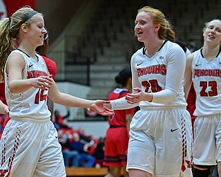 YOUNGSTOWN, OHIO - JANUARY 4, 2017: Youngstown State's Chelsea Olsen, left, is congratulated by Kelly Wright after making a three point basket as time expired in the third quarter of their game, Thursday night at Beeghly Center. 76-63. DAVID DERMER | THE VINDICATOR