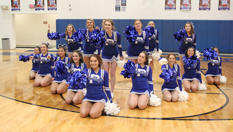 The Poland Bulldog cheerleaders perform a cheer before the start of Thursday nights matchup against Struthers at Poland    Dustin Livesay  |  The Vindicator  1/4/18  Poland.