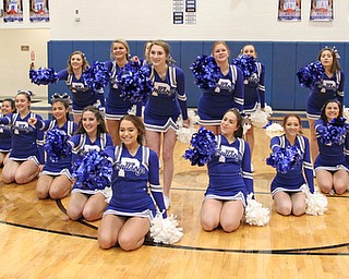 The Poland Bulldog cheerleaders perform a cheer before the start of Thursday nights matchup against Struthers at Poland    Dustin Livesay  |  The Vindicator  1/4/18  Poland.