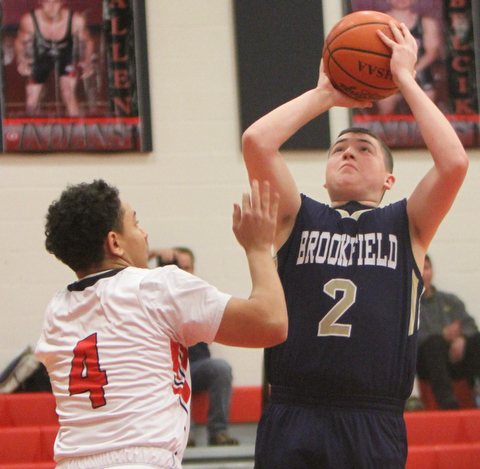 William D Lewis the vindicator  Brookfield'sNate Smoot(2) shoots past Girard's David Blackmon(4) during 1-5-18 action at Girard