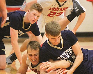 William D Lewis the vindicator  Girard'sMark Waid(15) and Brookfield's Brady Reichart(14) fight for the ball as Brookfield's Conner Stevens(1) and Girard's Christian Graziano(22) look on during 1-5-18 action at Girard.