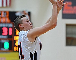 HOWLAND, OHIO - JANUARY 5, 2018: Howland's Frankie Manios shoots a three point shot during the first half of their game, Friday night at Howland HigH School. DAVID DERMER | THE VINDICATOR