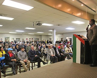 William D. Lewis the Vindicator Youngstown Mayor Tito Brown speaks during a vicotry party for Al Adi who won a stay of deportation. Adi is seated front row next to US Rep Tim Ryan.