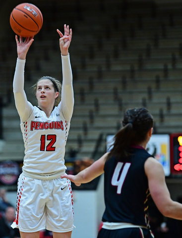YOUNGSTOWN, OHIO - JANUARY 6, 2017: Youngstown State's Chelsea Olsen shoots a three point shot over IUPUI's Holly Hoppingarner during the second half of their game, Saturday afternoon at Beeghly Center. IUPUI won 65-43. DAVID DERMER | THE VINDICATOR