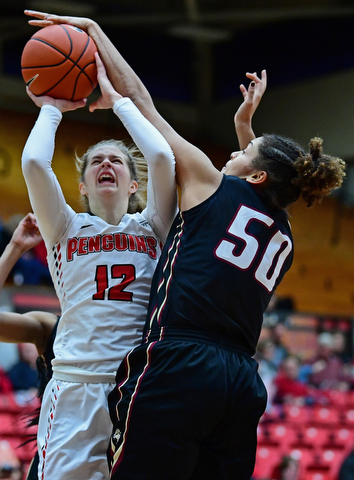 YOUNGSTOWN, OHIO - JANUARY 6, 2017: Youngstown State's Chelsea Olsen has her shot blocked by IUPUI's Macee Williams during the second half of their game, Saturday afternoon at Beeghly Center. IUPUI won 65-43. DAVID DERMER | THE VINDICATOR