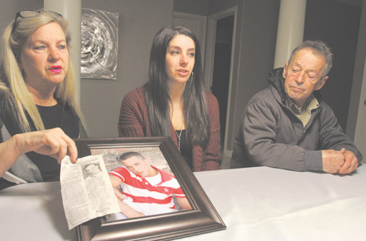 After Johnson died of an overdose at 27, his mother, Cheryl Puskas, left; sister, Courtney (Puskas) Worley; and father, Gus Johnson III, spoke out about Jordan’s struggle with addiction. His mother is holding his portrait and his obituary, in which she shared the story of his struggle in the hope it will help other families.