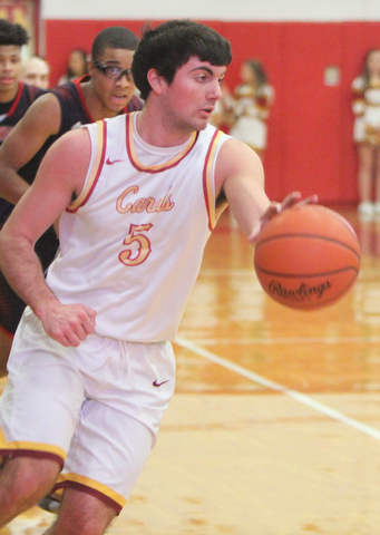 William D. Lewis  The Vindicaotr Mooney's Pete Haas(5) during 1-9-18 game with JFK.