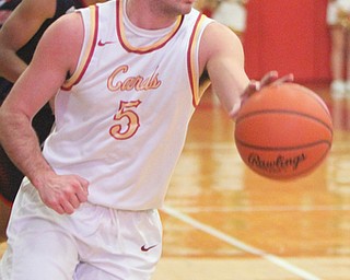 William D. Lewis  The Vindicaotr Mooney's Pete Haas(5) during 1-9-18 game with JFK.