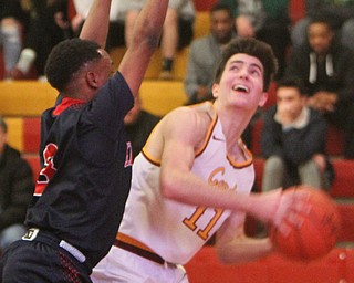 William D. Lewis The Vindicator JFK's Terrance King(3) and Mooney's Anthony Fire(11)