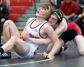 CANFIELD, OHIO - JANUARY 10, 2018: WRESTLING- Canfield's David Reinhart (black, 152 lbs) takes control of Boardman'sJohn Fleet (white, 152 lbs) at Canfield High School.  MICHAEL G TAYLOR | THE VINDICATOR