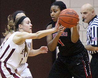 William D. Lewis  The Vindicator  Boardman's Cate Green(13) tries steal the ball from  Struthers'Kahylah Brown(1) during 1-10-18 action at Boardman