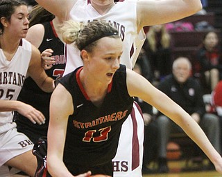 William D. Lewis  The Vindicator  Struthers' Alexis Bury(13) drives past Boardman's Annaliisa Cordova(43)) during 1-10-18 action at Boardman