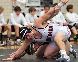 CANFIELD, OHIO - JANUARY 10, 2018: WRESTLING- Canfield's Anthony D'Alesio (black, 170 lbs) and Boardman's Karem Handem (white, 170 lbs) tangle during the 1st period of their match at Canfield High School.  MICHAEL G TAYLOR | THE VINDICATOR