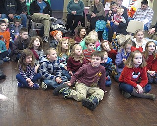 Neighbors | Zack Shively.Jennifer Kuczek had a Nutcracker party at the Boardman library on Dec. 27. Pictured, the children at the event listen to Kuczek read an adapted version of E.T.A. Hoffman's "The Nutcracker and the Mouse King."