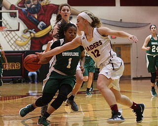 South Range's Bree Kohler (12) steals the ball from Ursuline's Dayshanette Harris (1) in the first half of an OSHAA girls high school basketball game, Thursday, Jan. 11, 2018, in Canfield. South Range won 54-49...(Nikos Frazier | The Vindicator)