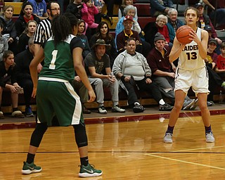 South Range's Maddi Durkin (13) goes up for three as Ursuline's Dayshanette Harris (1) watches on in the first half of an OSHAA girls high school basketball game, Thursday, Jan. 11, 2018, in Canfield. South Range won 54-49...(Nikos Frazier | The Vindicator)