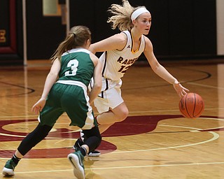 South Range's Bree Kohler (12) dribbles past Ursuline's Jamie Nelson (3) in the first half of an OSHAA girls high school basketball game, Thursday, Jan. 11, 2018, in Canfield. South Range won 54-49...(Nikos Frazier | The Vindicator)