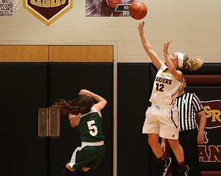 South Range's Bree Kohler (12) goes up for two over Ursuline's Cara McNally (5) in the second half of an OSHAA girls high school basketball game, Thursday, Jan. 11, 2018, in Canfield. South Range won 54-49...(Nikos Frazier | The Vindicator)