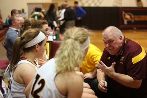 South Range head coach Tony Matisi talks his players during a timeout in the second half of an OSHAA girls high school basketball game, Thursday, Jan. 11, 2018, in Canfield. South Range won 54-49...(Nikos Frazier | The Vindicator)