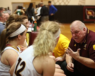 South Range head coach Tony Matisi talks his players during a timeout in the second half of an OSHAA girls high school basketball game, Thursday, Jan. 11, 2018, in Canfield. South Range won 54-49...(Nikos Frazier | The Vindicator)