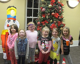 Neighbors | Zack Shively.Girl Scout Troop 80200 went to the Poland library for the "Nutcracker Sweets" event that gave them a story, many crafts and activities and sweets.