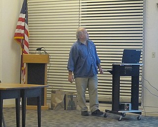 Neighbors | Zack Shively.Tim Seman, a genealogy librarian at the Main library in Youngstown, gave a presentation at the Austintown library on Dec. 7 on Christmas traditions throughout the world including countries such as South Africa, India, Australia and Italy.