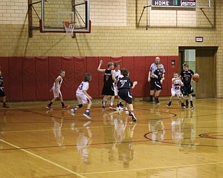 Neighbors | Abby Slanker.Two Canfield Cardinals fifth-grade basketball teams battled each other during the fourth annual Canfield Cardinal Classic Boys Basketball Tournament on Dec. 9.