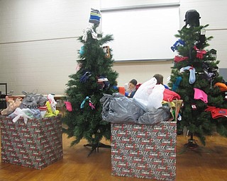 Neighbors | Zack Shively.Poland Dobbins Elementary School's PTO set up a Giving Tree Project, where students donated winter clothing to Mahoning County Children Services through Dec. 4-15.