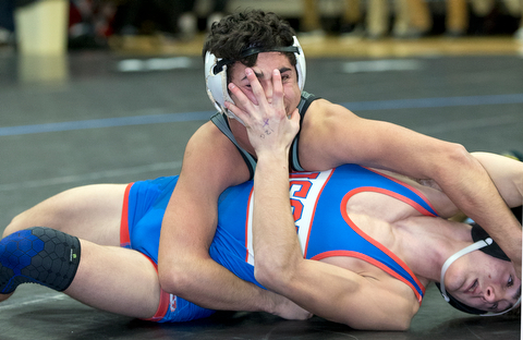 ALLIANCE, OHIO - JANUARY 10, 2018: TOP GUN WRESTLING- West Branch's Christian Wayt (black) scores a near takedown against  Ft. Leboeuf's Issac Crowell (blue) during the 120 lbs match at Alliance High School.  MICHAEL G TAYLOR | THE VINDICATOR