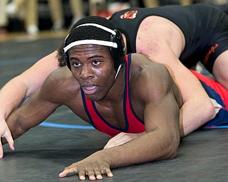 ALLIANCE, OHIO - JANUARY 10, 2018: TOP GUN WRESTLING- Austintown's Breylon Douglas (red) is in the grasp of Hoover's Ben Smith (black) in the championship 195 lbs match at Alliance High School.  MICHAEL G TAYLOR | THE VINDICATOR