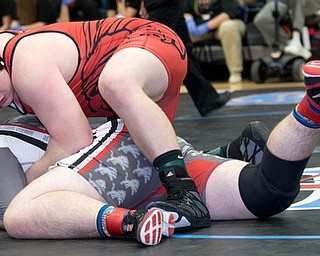 ALLIANCE, OHIO - JANUARY 10, 2018: TOP GUN WRESTLING- Girard'sJack Delgarbino (red) sets up Minerva's Travis Kuttler (gray) for the pin in the championship 285 lbs match at Alliance High School.  MICHAEL G TAYLOR | THE VINDICATOR