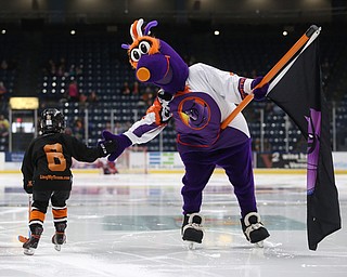 Phantoms mascot Boomer high fives a young player before the first period of an USHL regular season hockey game, Monday, Jan. 15, 2018, in Youngstown. Team USA won 7-1...(Nikos Frazier | The Vindicator)