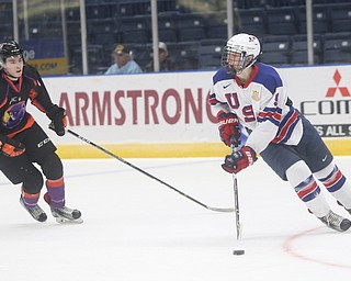 Team USA forward Tyler Weiss (9) skates past Youngstown Phantoms forward Alex Barber (92) in the second period of an USHL regular season hockey game, Monday, Jan. 15, 2018, in Youngstown. Team USA won 7-1...(Nikos Frazier | The Vindicator)