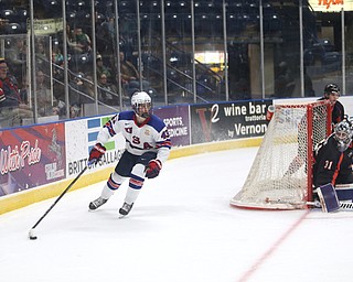 Team USA forward Jack Hughes (43) skates behind the net as Youngstown Phantoms goalie Ivan Prosvetov (31) turns to watch in the second period of an USHL regular season hockey game, Monday, Jan. 15, 2018, in Youngstown. Team USA won 7-1...(Nikos Frazier | The Vindicator)