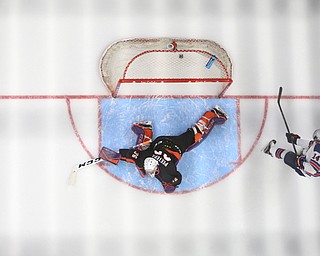 Team USA forward Jack DeBoer (14) scores a goal past Youngstown Phantoms goalie Wouter Peeters (36) in the third period of an USHL regular season hockey game, Monday, Jan. 15, 2018, in Youngstown. Team USA won 7-1...(Nikos Frazier | The Vindicator)