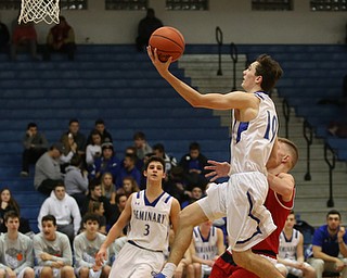 Poland forward Daniel Kramer (10) goes up for a layup in the fourth quarter of an AAC high school basketball game, Tuesday, Jan. 16, 2018, in Poland. Poland won 70-56...(Nikos Frazier | The Vindicator)