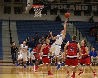 Poland guard Bradon Barringer (13) jumps back to put up two in the fourth quarter of an AAC high school basketball game, Tuesday, Jan. 16, 2018, in Poland. Poland won 70-56...(Nikos Frazier | The Vindicator)