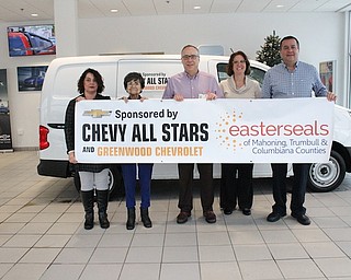 Easter Seals of Mahoning, Trumbull and Columbiana counties recently partnered with The Chevy All Stars, Greenwood Chevrolet, Youngstown Foundation, Ruth Beecher Charitable Foundation and First Place Community Fund to purchase a new delivery van. The new van allows for meals to be delivered to more clients’ homes. Easter Seals services include: physical, aquatic, occupational and speech therapies; adult day center; child development center (preschool/daycare), community center for the deaf; home-delivered meals; congregate meal sites; skill development center for adults with autism spectrum disorder or developmental disabilities; transportation; weekend respite for medically fragile children; and children with autism and teen group. For information, call 330-743-1168 or visit www.mtc.easterseals.com. Above, from left, are Donna Banks, nutrition program coordinator; Sue Lesko, Easter Seals client and volunteer; Tim Nelson, president and CEO of Easter Seals; Vikki Cunningham, community services manager; and Nick Amendola, commercial sales manager with Greenwood Chevrolet.