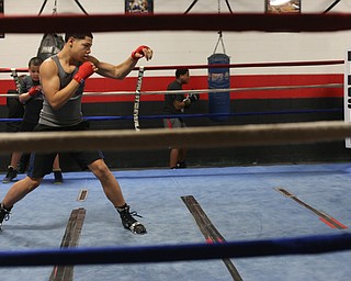 Brayan Colon warms up inside the rink, Tuesday, Jan. 16, 2018, at the Southside Boxing Gym in Youngstown...(Nikos Frazier | The Vindicator)