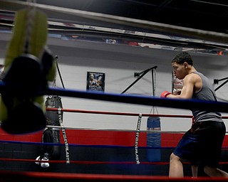 Brayan Colon warms up inside the rink, Tuesday, Jan. 16, 2018, at the Southside Boxing Gym in Youngstown...(Nikos Frazier | The Vindicator)