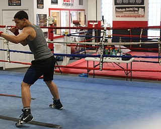 Brayan Colon warms up inside the rink, Tuesday, Jan. 16, 2018, at the Southside Boxing Gym in Youngstown...(Nikos Frazier | The Vindicator)