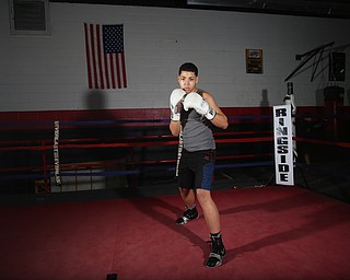 Brayan Colon poses for a photo, Tuesday, Jan. 16, 2018, at the Southside Boxing Gym in Youngstown...(Nikos Frazier | The Vindicator)