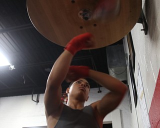 Brayan Colon works the speed bag, Tuesday, Jan. 16, 2018, at the Southside Boxing Gym in Youngstown...(Nikos Frazier | The Vindicator)