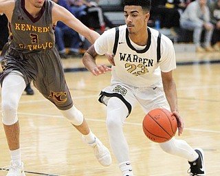 William D Lewis The Vindicator Harding's Dom McGhee(23) drives around Kennedy's Isaac Herster(3).