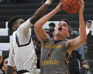 William D Lewis the Vindicator  Harding's Terrion Jackson(1) tries to block a shot from Kennedy's Mattia Acunzo(4).