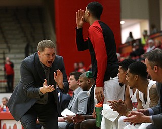 Youngstown State head coach Jerrod Calhoun pumps up the bench in the first half of a NCAA college basketball game against UIC, Thursday, Jan. 18, 2018, in Youngstown. UIC won 92-78...(Nikos Frazier | The Vindicator)