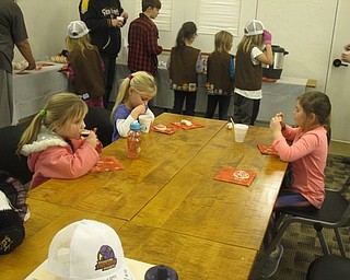 Neighbors | Zack Shively.The Austintown library also offered cookies and hot chocolate for the children after the Phantoms  players had a story time. The games, crafts and the drink all had a hockey or winter theme.