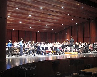 Neighbors | Zack Shively.The seventh grade concert band, under the direction of Michael Shevock, took the stage after the fifth grade band. Pictured, the band performed "Grace Valley Overture" by Steve Hodges.