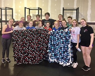 Neighbors | Submitted .Blankets were created by Boardman Team Unity Building Team 1 for the Akron’s Children’s Hospital. Team members include (front) Aadia Brinkley, Gizzy Kelso, Ava Velasquez, Sarah Varga, Mia Bruno, Sarah Murray, Ali Kuras, Delany Notar, Maddie Connolly; (back) Madison Riccuiti, Mason Rassega, Jake Thomas, David Giancola, Matthew DunLany and Siman Mascola..